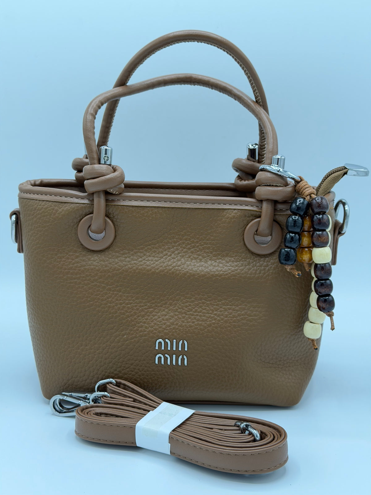 Luxury hand bag with crossbody strep